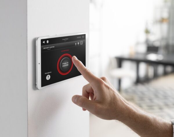 man-using-tablet-his-smart-home